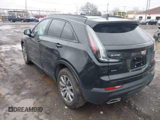2023 Cadillac XT4 AWD Sport with VIN 1GYFZFR43PF104069, listed as a IAAI auction lot 41736071 with 22,872 mi miles. Bid and sale history available at carsss.com. Image 3.