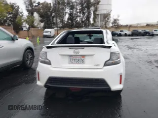 2014 Scion tC z VIN JTKJF5C77E3080128, wystawiony jako IAAI lot #42174898 z przebiegiem Nie podano mil oraz . Historia ofert i sprzedaży dostępna na DreamBid. Obrazek 16.
