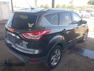 2015 Ford Escape Titanium with VIN 1FMCU0J92FUA20469, listed as a IAAI auction lot 42510293 with 161,466 mi miles and . Bid and sale history available at DreamBid. Image 4.