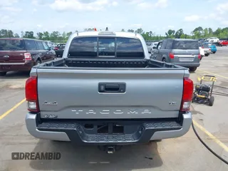 2023 Toyota Tacoma SR with VIN 3TYCZ5AN4PT149730, listed as a IAAI auction lot 42083146 with 31,731 mi miles and . Bid and sale history available at DreamBid. Image 16.