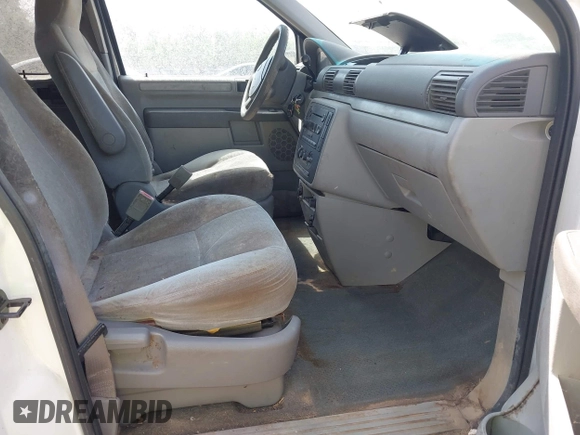 2006 Ford Freestar SE z VIN 2FMZA51626BA54942, wystawiony jako IAAI lot #42133277 z przebiegiem 119 296 mil mil oraz . Historia ofert i sprzedaży dostępna na DreamBid. Obrazek 5.