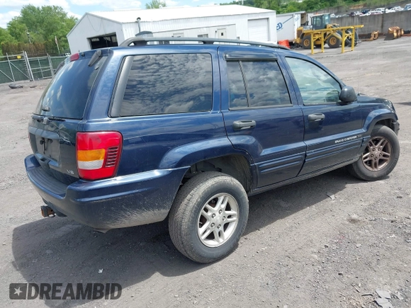 2004 Jeep Grand Cherokee Laredo with VIN 1J4GW48N94C407642, listed as a IAAI auction lot 42381436 with 177,141 mi miles and . Bid and sale history available at DreamBid. Image 4.