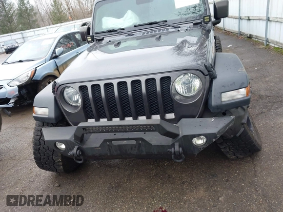 2020 Jeep Wrangler Unlimited Sport z VIN 1C4HJXDN3LW164701, wystawiony jako IAAI lot #41200437 z przebiegiem 102 272 mil mil oraz . Historia ofert i sprzedaży dostępna na DreamBid. Obrazek 12.