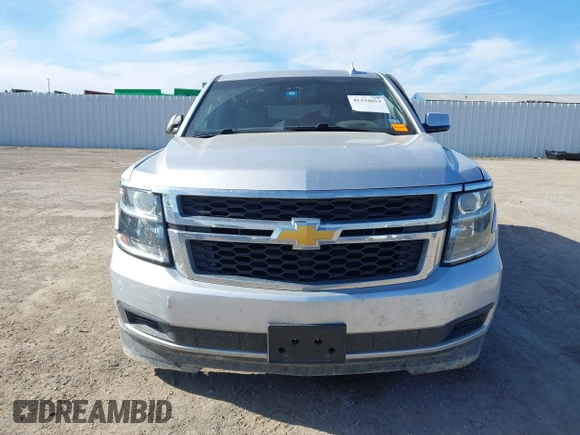 2020 Chevrolet Tahoe LT with VIN 1GNSCBKC5LR226822, listed as a IAAI auction lot 41334853 with 77,091 mi miles and . Bid and sale history available at DreamBid. Image 12.