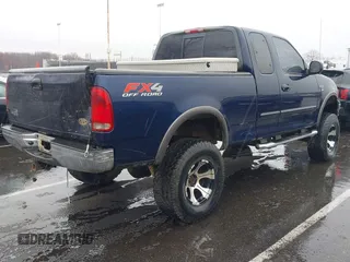 2003 Ford F-150 XL with VIN 1FTRX18L73NA26027, listed as a IAAI auction lot 41843867 with 1 mi miles. Bid and sale history available at carsss.com. Image 4.