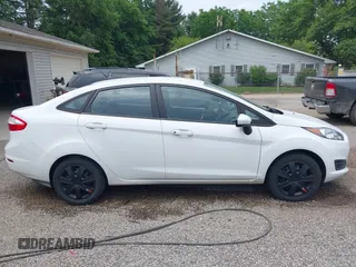 2014 Ford Fiesta S z VIN 3FADP4AJ6EM168697, wystawiony jako IAAI lot #42438281 z przebiegiem 78 298 mil mil oraz . Historia ofert i sprzedaży dostępna na DreamBid. Obrazek 13.