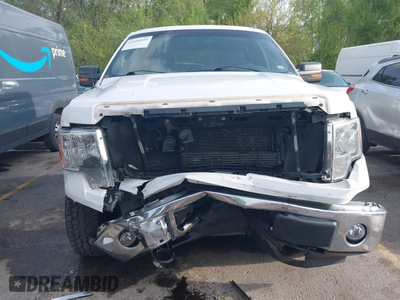 2014 Ford F-150 XL with VIN 1FTFW1EFXEKE92754, listed as a IAAI auction lot 42109551 with 219,130 mi miles. Bid and sale history available at carsss.com. Image 6.