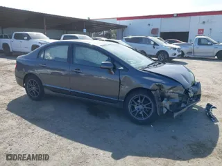 2011 Honda Civic Sdn LX with VIN 2HGFA1F59BH503980, listed as a IAAI auction lot 41892694 with 122,372 mi miles. Bid and sale history available at carsss.com. Image 1.