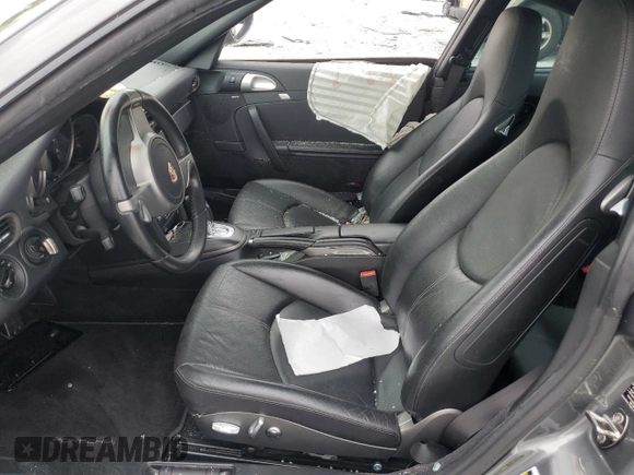 2010 Porsche 911 Carrera with VIN WP0AA2A99AS706111, listed as a Copart auction lot 44523405 with Not Provided miles and Salvage Title. Bid and sale history available at DreamBid. Image 7.