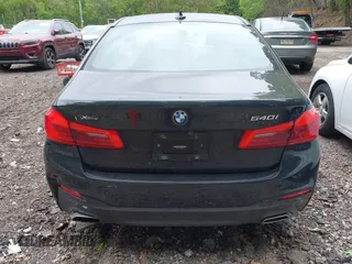 2018 BMW 5 Series 540i xDrive with VIN WBAJE7C58JG891098, listed as a IAAI auction lot 42331320 with 55,172 mi miles and . Bid and sale history available at DreamBid. Image 16.