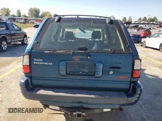 2001 Isuzu Rodeo S with VIN 4S2DM58W914301991, listed as a Copart auction lot 76518844 with 165,789 mi miles and Salvage Title. Bid and sale history available at DreamBid. Image 6.
