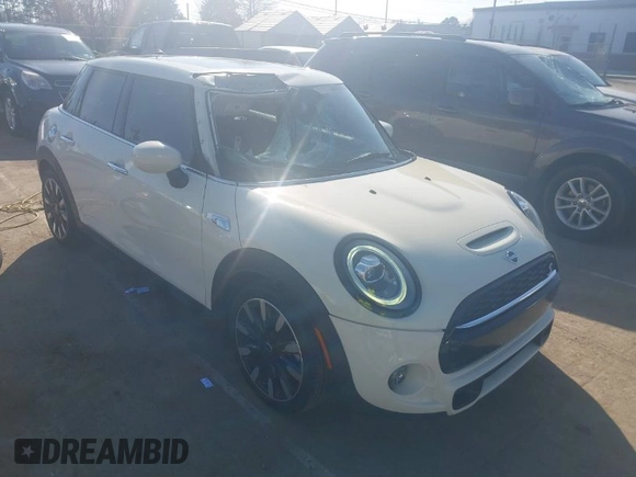 2021 MINI Hardtop 4 Door Cooper S with VIN WMWXU9C00M2P04693, listed as a IAAI auction lot 41785185 with 57,848 mi miles and . Bid and sale history available at DreamBid. Image 1.