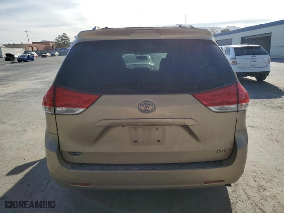 2012 Toyota Sienna XLE AAS with VIN 5TDYK3DC2CS221149, listed as a Copart auction lot 49300155 with 111,808 mi miles and Salvage Title. Bid and sale history available at carsss.com. Image 6.