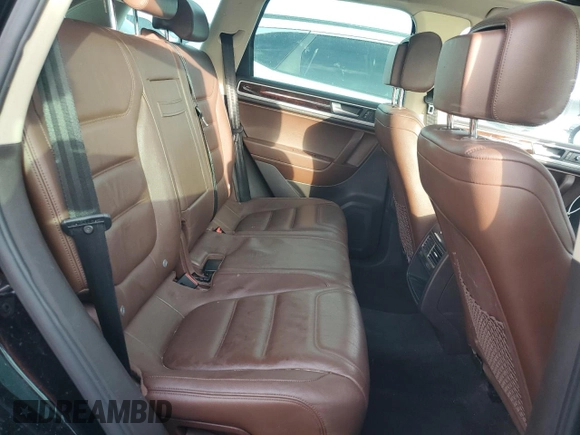 2012 Volkswagen Touareg Exec with VIN WVGEF9BP1CD011407, listed as a Copart auction lot 79199754 with 57,376 mi miles and Salvage Title. Bid and sale history available at DreamBid. Image 11.