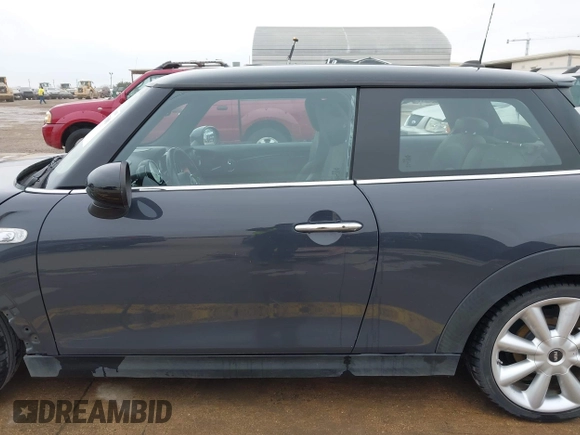 2014 MINI Hardtop S with VIN WMWXM7C56ET926604, listed as a IAAI auction lot 41642560 with 81,219 mi miles and . Bid and sale history available at DreamBid. Image 14.