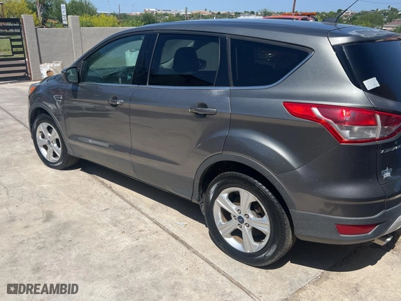 2014 Ford Escape SE with VIN 1FMCU0GX0EUC29973, listed as a Copart auction lot 52974065 with 97,009 mi miles and Clean Title. Bid and sale history available at carsss.com. Image 3.