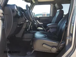 2013 Jeep Wrangler Unlimited Sahara with VIN 1C4BJWEG5DL662756, listed as a Copart auction lot 56423615 with 189,355 mi miles and Salvage title. Bid and sale history available at DreamBid. Image 7.
