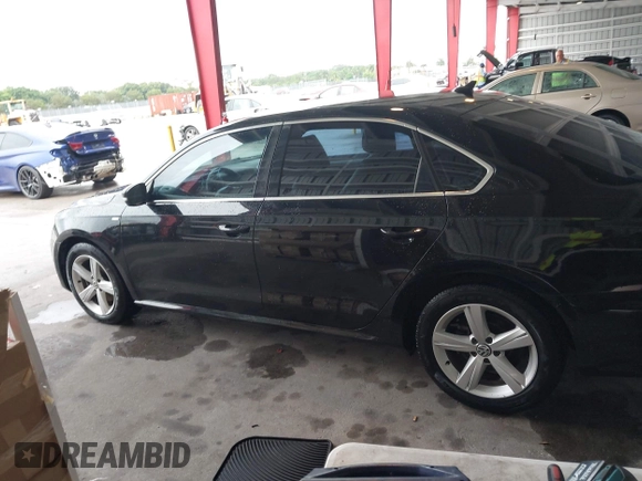 2014 Volkswagen Passat S with VIN 1VWAT7A37EC035831, listed as a IAAI auction lot 42648263 with 118,081 mi miles and . Bid and sale history available at DreamBid. Image 14.