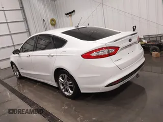 2015 Ford Fusion SE Hybrid with VIN 3FA6P0LU8FR215788, listed as a IAAI auction lot 42038194 with 136,949 mi miles and . Bid and sale history available at DreamBid. Image 14.