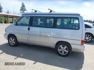 2003 Volkswagen EuroVan MV with VIN WV2NB47003H003131, listed as a IAAI auction lot 42157821 with 166,159 mi miles and . Bid and sale history available at DreamBid. Image 14.