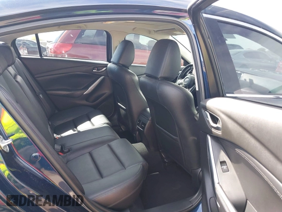 2015 Mazda 6 i Touring with VIN JM1GJ1V61F1170532, listed as a IAAI auction lot 42078436 with 154,630 mi miles and . Bid and sale history available at DreamBid. Image 8.