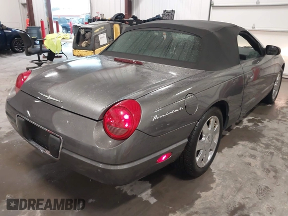 2003 Ford Thunderbird Deluxe z VIN 1FAHP60A53Y113819, wystawiony jako IAAI lot #41724732 z przebiegiem Nie podano mil oraz . Historia ofert i sprzedaży dostępna na DreamBid. Obrazek 4.