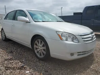 2007 Toyota Avalon XL z VIN 4T1BK36B37U186984, wystawiony jako IAAI lot #42130363 z przebiegiem 159 182 mil mil oraz . Historia ofert i sprzedaży dostępna na DreamBid. Obrazek 1.