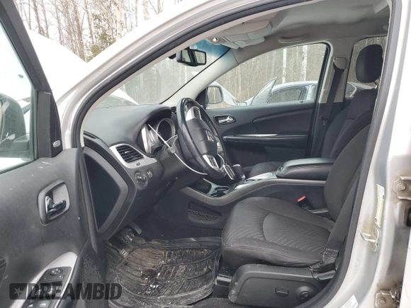 2013 Dodge Journey Crew with VIN 3C4PDCCG4DT698618, listed as a Copart auction lot 87632875 with 198,284 mi miles and Salvage title. Bid and sale history available at DreamBid. Image 7.