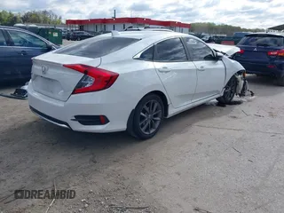 2019 Honda Civic EX z VIN 19XFC1F30KE208186, wystawiony jako IAAI lot #42020997 z przebiegiem 115 430 mil mil oraz . Historia ofert i sprzedaży dostępna na DreamBid. Obrazek 4.