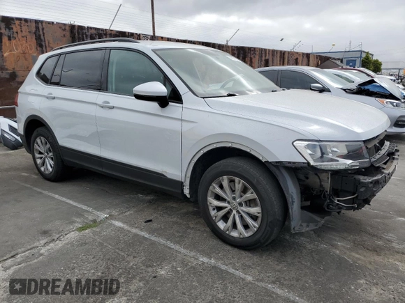 2018 Volkswagen Tiguan S with VIN 3VV1B7AXXJM013468, listed as a Copart auction lot 58371875 with 61,464 mi miles and Salvage title. Bid and sale history available at DreamBid. Image 4.