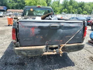 2000 Ford F-250 XL с VIN 1FTNF20L2YEC41003, выставлен на аукционе Copart как лот 60783275 с пробегом 228 584 миль миль и Списание • Salvage title. История ставок и продаж доступна на DreamBid. Изображение 6.