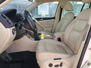 2012 Volkswagen Tiguan SE with VIN WVGAV7AX1CW530016, listed as a Copart auction lot 48551935 with 102,455 mi miles and Salvage Title. Bid and sale history available at DreamBid. Image 7.