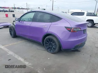 2021 Tesla Model Y Long Range with VIN 5YJYGDEE7MF224531, listed as a IAAI auction lot 38454442 with 52,408 mi miles. Bid and sale history available at carsss.com. Image 3.