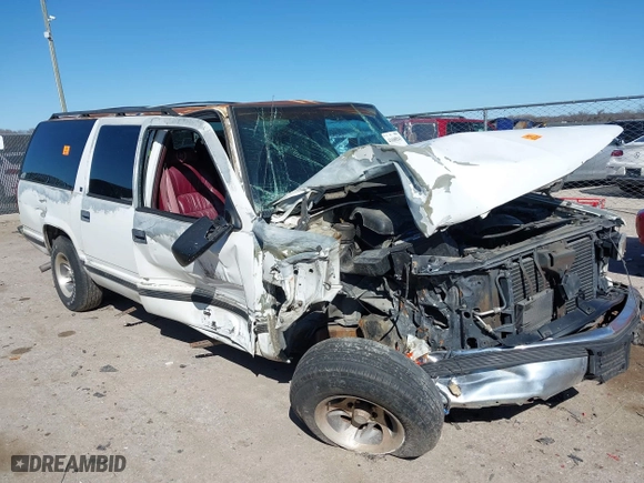1996 GMC Suburban with VIN 1GDEC16R8TJ738647, listed as a IAAI auction lot 41688543 with 216,078 mi miles. Bid and sale history available at carsss.com. Image 1.