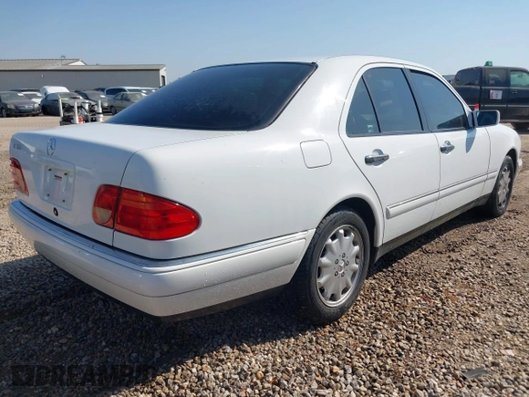 1999 Mercedes-Benz E-Class with VIN WDBJF65H6XA867166, listed as a IAAI auction lot 42017341 with 89,841 mi miles. Bid and sale history available at carsss.com. Image 4.