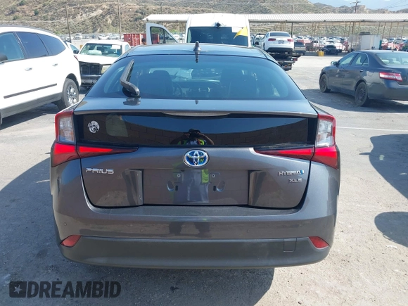 2021 Toyota Prius L Eco with VIN JTDKAMFU4M3144985, listed as a IAAI auction lot 42443957 with 20,816 mi miles and . Bid and sale history available at DreamBid. Image 16.