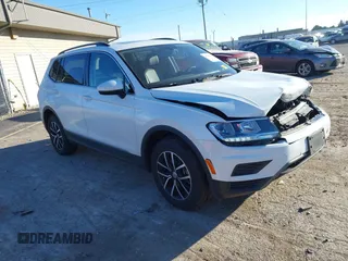 2021 Volkswagen Tiguan SE z VIN 3VV2B7AX5MM139410, wystawiony jako IAAI lot #40993918 z przebiegiem 55 446 mil mil oraz . Historia ofert i sprzedaży dostępna na DreamBid. Obrazek 1.