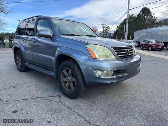 2004 Lexus GX 470 with VIN JTJBT20X040033026, listed as a Copart auction lot 51527405 with 164,108 mi miles and Clean Title. Bid and sale history available at carsss.com. Image 1.