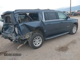 2019 GMC Yukon XL SLT with VIN 1GKS2GKC0KR345860, listed as a IAAI auction lot 40727072 with 127,568 mi miles and . Bid and sale history available at carsss.com. Image 4.