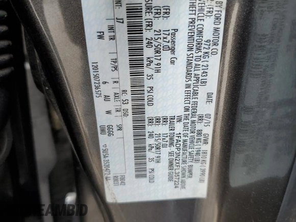 2015 Ford Focus Titanium z VIN 1FADP3N2XFL357224, wystawiony jako Copart lot #55626575 z przebiegiem 159 422 mil mil oraz Szkoda całkowita • Salvage title. Historia ofert i sprzedaży dostępna na DreamBid. Obrazek 12.