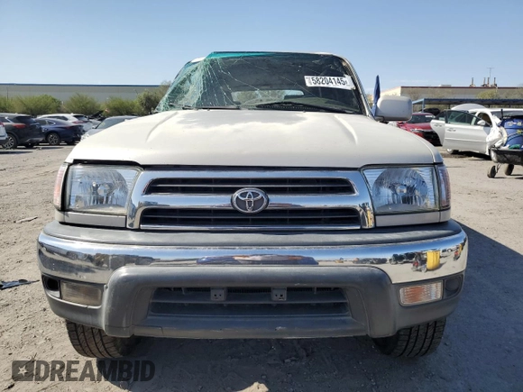 1999 Toyota 4Runner SR5 with VIN JT3GN86R4X0099618, listed as a Copart auction lot 58204145 with 297,759 mi miles and Salvage title. Bid and sale history available at DreamBid. Image 5.
