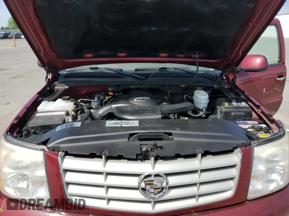2005 Cadillac Escalade z VIN 1GYEK63N95R203413, wystawiony jako Copart lot #53366075 z przebiegiem 219 026 mil mil oraz Szkoda całkowita • Salvage title. Historia ofert i sprzedaży dostępna na DreamBid. Obrazek 12.