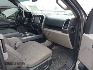 2015 Ford F-150 XLT with VIN 1FTEX1EP9FFC75210, listed as a IAAI auction lot 39041797 with 125,522 mi miles. Bid and sale history available at carsss.com. Image 5.
