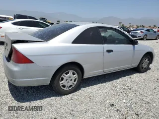 2001 Honda Civic LX with VIN 1HGEM215X1L044492, listed as a Copart auction lot 58766494 with 307,400 mi miles and Salvage Title. Bid and sale history available at carsss.com. Image 3.