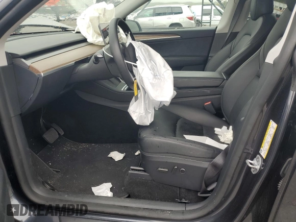 2024 Tesla Model Y Long Range с VIN 7SAYGDEE7RF180945, выставлен на аукционе Copart как лот 62059735 с пробегом Не указан миль и Списание • Salvage title. История ставок и продаж доступна на DreamBid. Изображение 7.