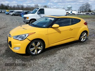 2012 Hyundai Veloster w/Black Int с VIN KMHTC6ADXCU028051, выставлен на аукционе Copart как лот 52191975 с пробегом 148 806 миль миль и Списание • Salvage title. История ставок и продаж доступна на DreamBid. Изображение 1.