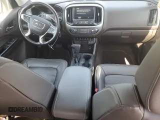 2021 GMC Canyon 4WD Denali with VIN 1GTG6EEN4M1221938, listed as a Copart auction lot 48760965 with 63,231 mi miles and Salvage Title. Bid and sale history available at carsss.com. Image 8.