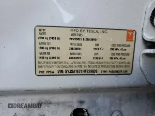 2017 Tesla Model S 100D z VIN 5YJSA1E21HF229936, wystawiony jako Copart lot #54734955 z przebiegiem 125 511 mil mil oraz Szkoda całkowita • Salvage title. Historia ofert i sprzedaży dostępna na DreamBid. Obrazek 13.