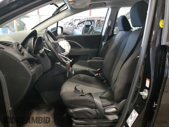2012 Mazda 5 Touring with VIN JM1CW2CL1C0110282, listed as a Copart auction lot 69524284 with 108,872 mi miles and Salvage Title. Bid and sale history available at DreamBid. Image 7.