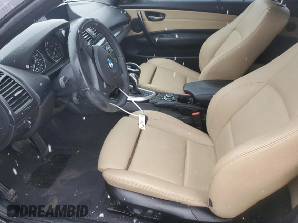 2011 BMW 1 Series 135i z VIN WBAUN7C50BVM24400, wystawiony jako Copart lot #82216194 z przebiegiem Nie podano mil oraz Szkoda całkowita • Salvage title. Historia ofert i sprzedaży dostępna na DreamBid. Obrazek 7.